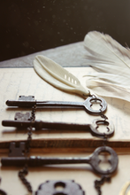 Load image into Gallery viewer, Old Bonedown&#39;s Three Keys. Storyteller Series. Antique Skeleton Key &amp; Carved Bone Feather Necklace.