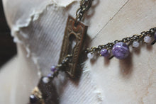 Load image into Gallery viewer, Tidings Curiosity Shoppe. Storyteller Series. Antique Escutcheon &amp; Figa Statement Necklace.