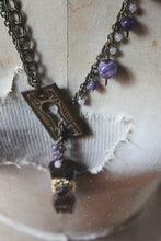 Load image into Gallery viewer, Tidings Curiosity Shoppe. Storyteller Series. Antique Escutcheon &amp; Figa Statement Necklace.