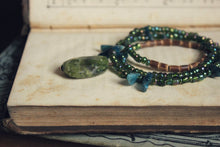 Load image into Gallery viewer, Laguz. Hand-strung Vesuvianite, Apatite, Wood and Glass Beaded Necklace.