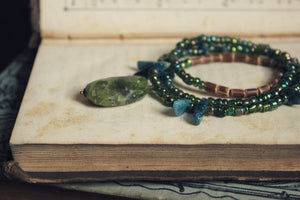 Laguz. Hand-strung Vesuvianite, Apatite, Wood and Glass Beaded Necklace.