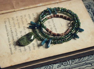 Laguz. Hand-strung Vesuvianite, Apatite, Wood and Glass Beaded Necklace.