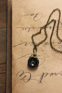 The Eye of Moriarty. Storyteller Series. Antique Glass Button Necklace.