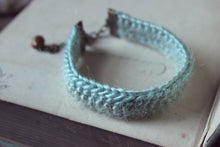 Load image into Gallery viewer, The Haefen Tearoom. Storyteller Series. Hand Crocheted Cuff Bracelet.