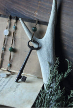 Load image into Gallery viewer, The Bindwood Stag Lodge. Storyteller Series. Skeleton Key, Antler and Gemstone Rosary Style Necklace.