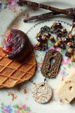 Load image into Gallery viewer, Honeystalks Bakery. Storyteller Series. Ceramic Pendant, Czech Glass and Sandalwood Necklace.