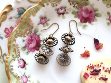 Load image into Gallery viewer, Tea Lights. Ivory Faceted Glass and Antiqued Brass Earrings.